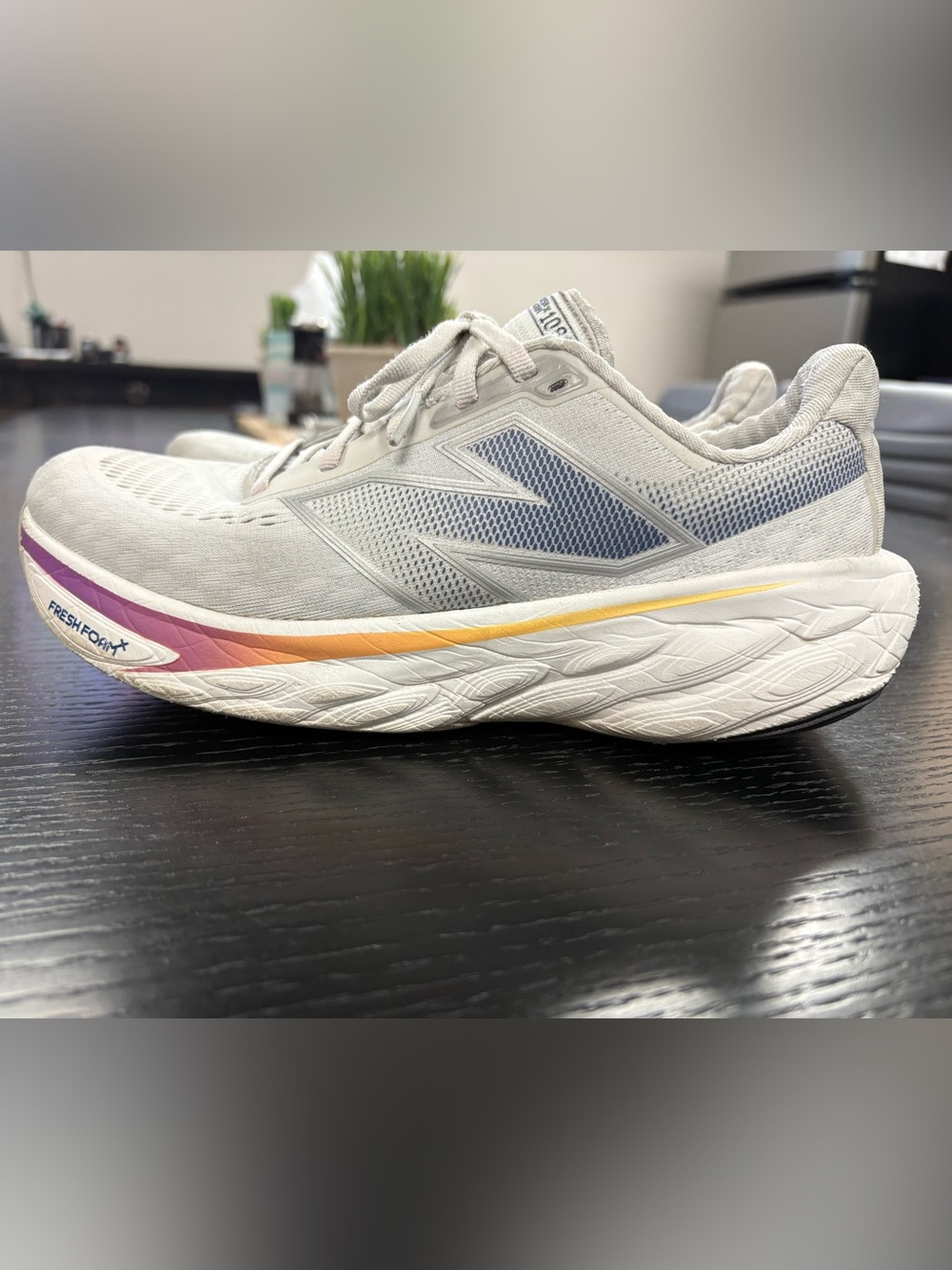 New Balance Light Gray Sneakers with Purple and Yellow Accent